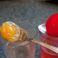 Naked egg on a spoon
