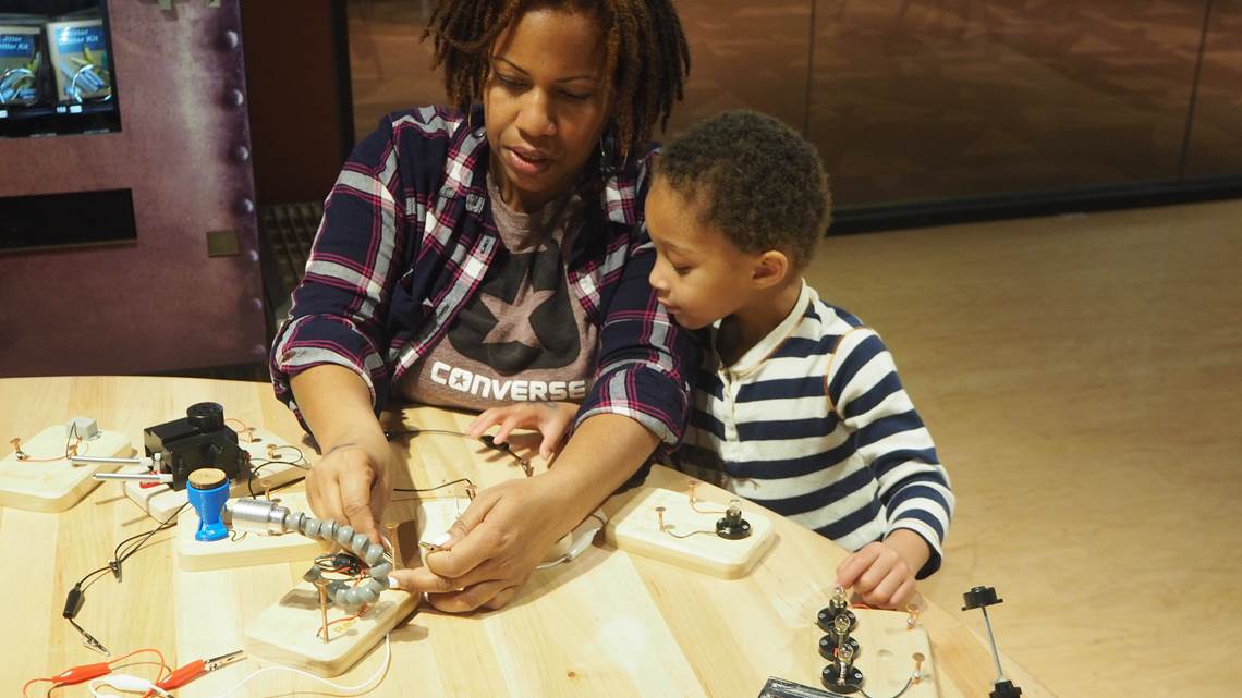 Mother and son using circuit blocks