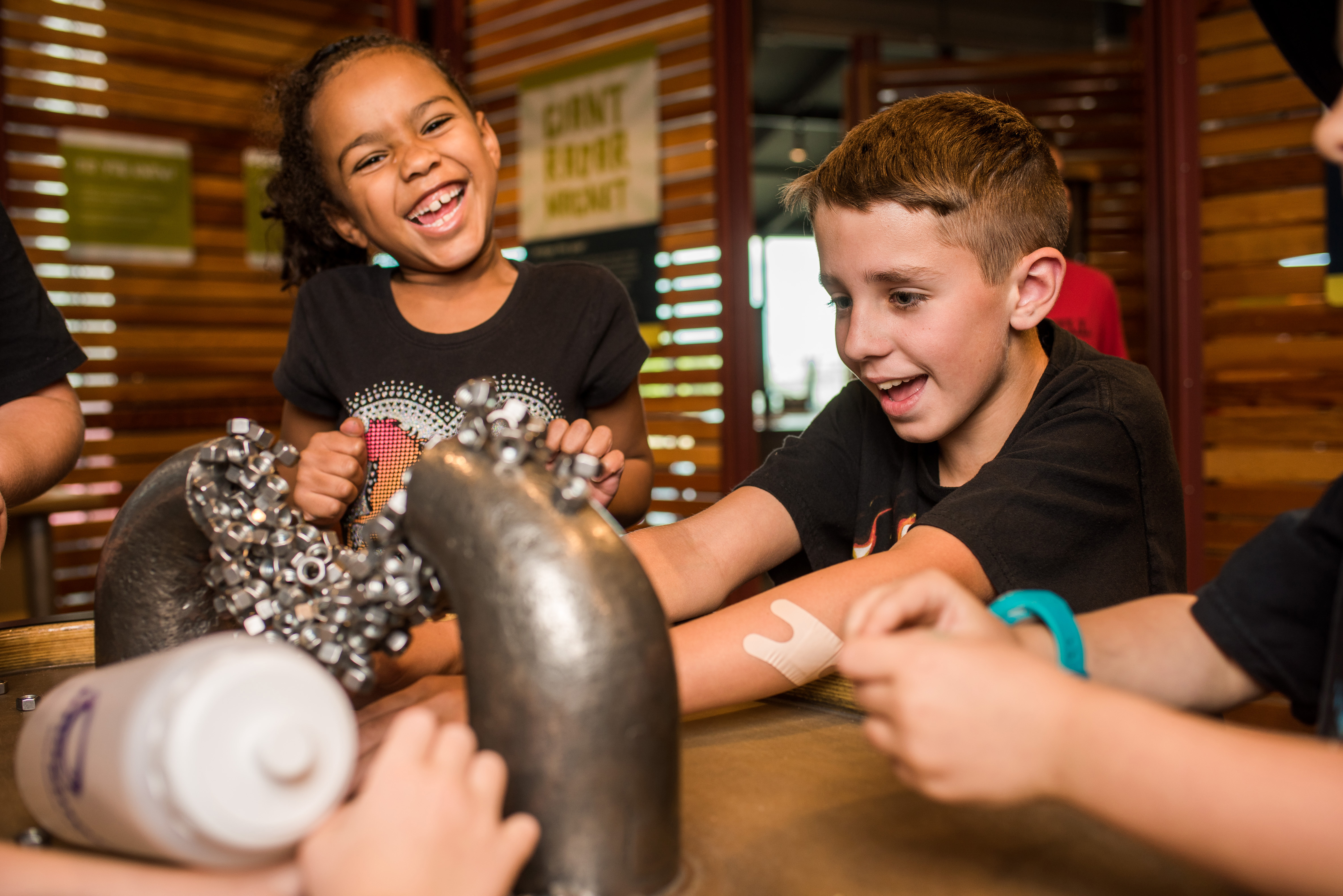 Kids interacting with magnets 